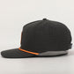 Black cap with orange accents on a light gray background