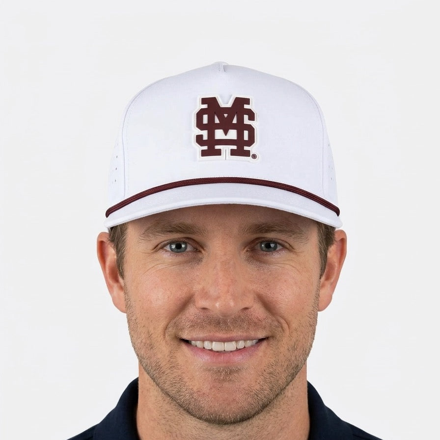 Guy wearing white MSU hat