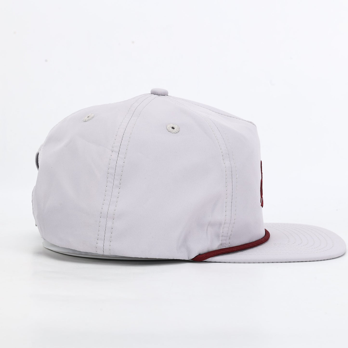 White cap with red interior on a white background