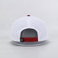 White baseball cap with red accents on a light gray background